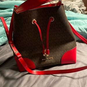 Michael Kors red and brown purse